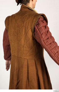  Photos Medieval Servant in suit 5 17th century Historical clothing Historical servant brown jacket red gambeson upper body 0007.jpg